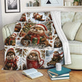 Festive otter blanket draped over a sofa with Christmas gifts, ornaments, and winter holiday artwork