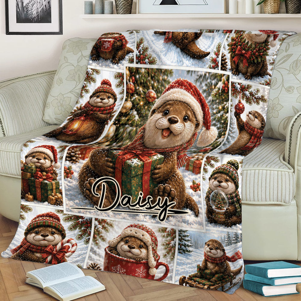 Christmas otter throw blanket spread across a sofa with snowy holiday scenes and colorful gift artwork