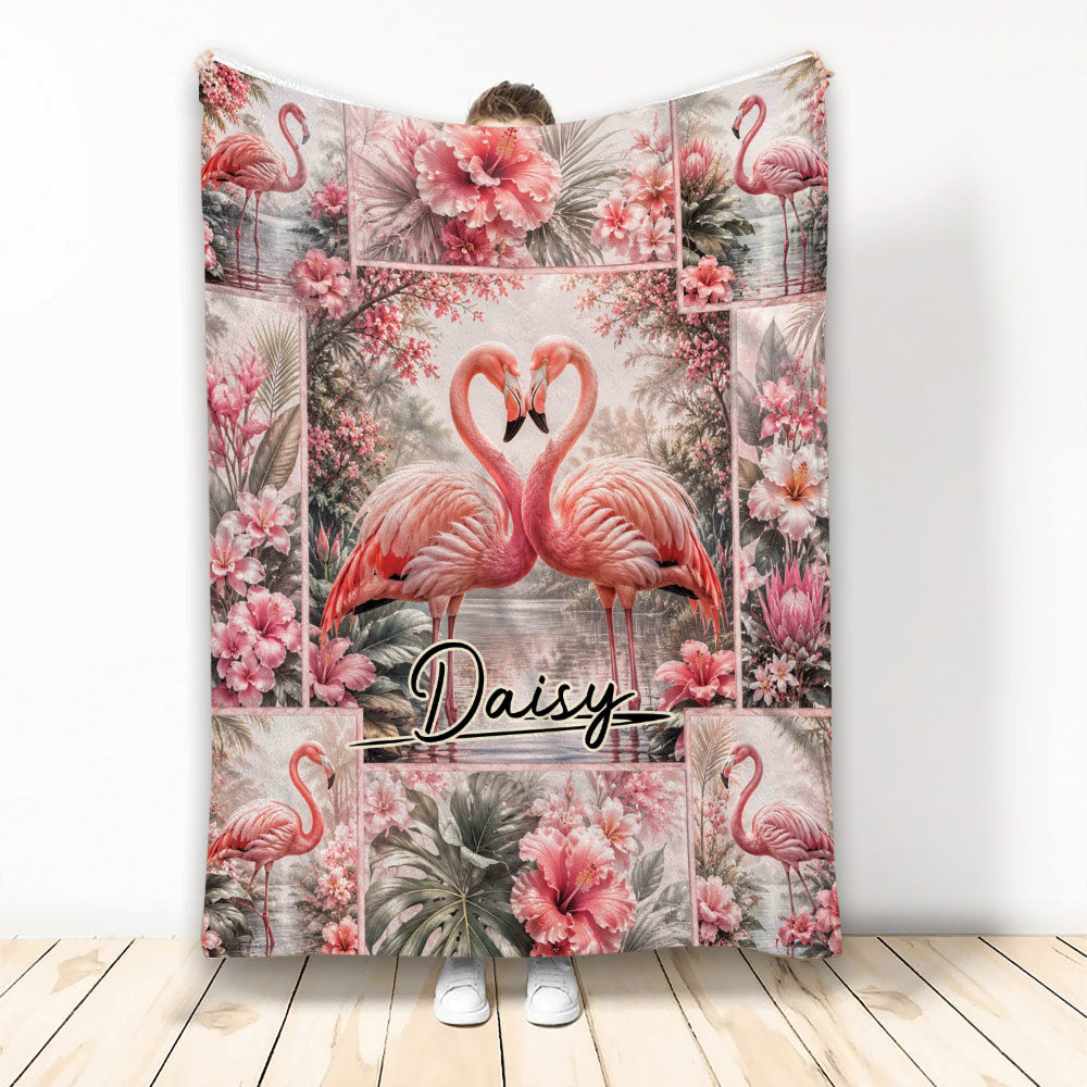 Flamingo throw blanket with tropical flowers, paired flamingos, and pink botanical artwork