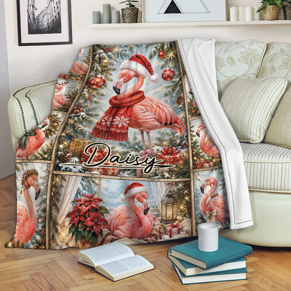 Festive flamingo blanket draped over a sofa, featuring Christmas ornaments, gifts, scarves, and evergreen branches