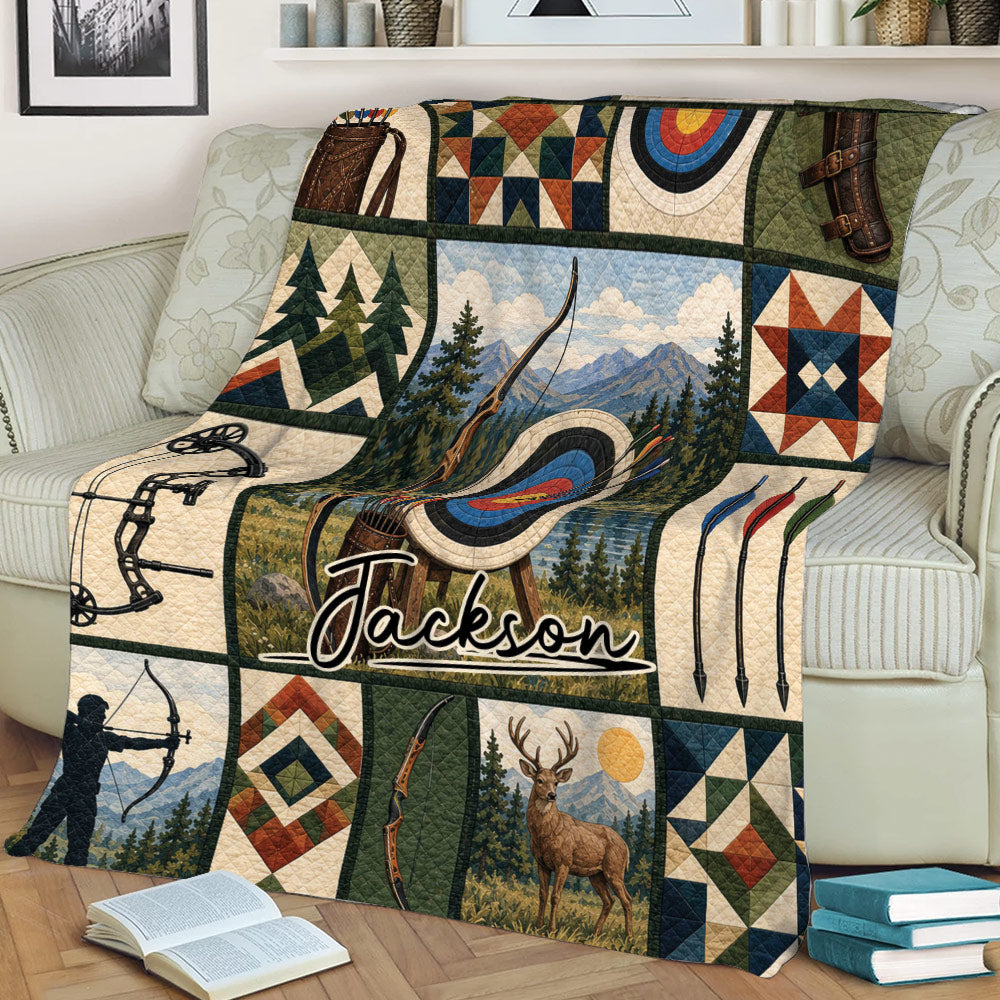 Rustic archery blanket draped over a couch with target, bow, arrows, forest, mountain, and deer artwork