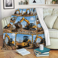 Excavator throw blanket displayed on a sofa with detailed construction equipment collage design