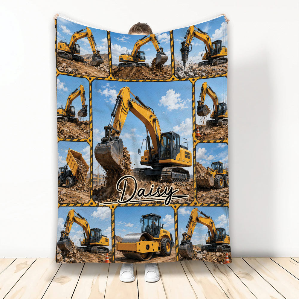 Excavator throw blanket featuring yellow construction machinery collage artwork held upright