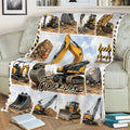 Construction-themed excavator blanket displayed across a sofa with heavy machinery collage artwork