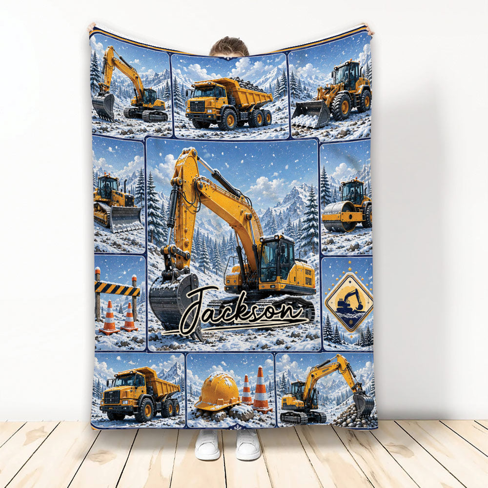 Excavator throw blanket displayed upright with construction equipment in a snowy mountain scene