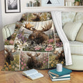 Floral moose throw blanket draped over a sofa in a cozy living room setting