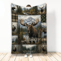 Moose throw blanket featuring a large antlered moose, mountain forest landscape, lake scenes, and plaid accents