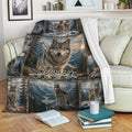 Wolf blanket draped over a sofa, featuring a large wolf, alpine mountains, pine forests, and scenic wildlife panels