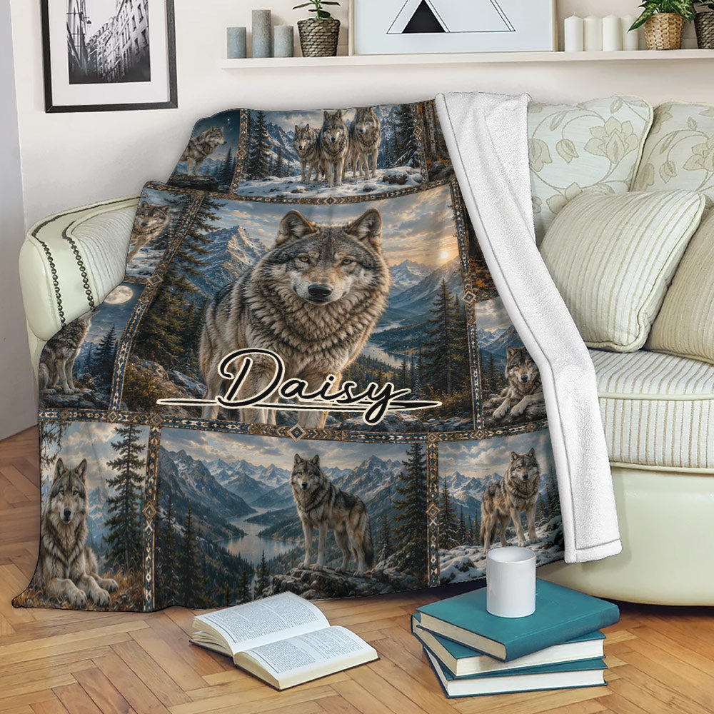 Wolf blanket draped over a sofa, featuring a large wolf, alpine mountains, pine forests, and scenic wildlife panels