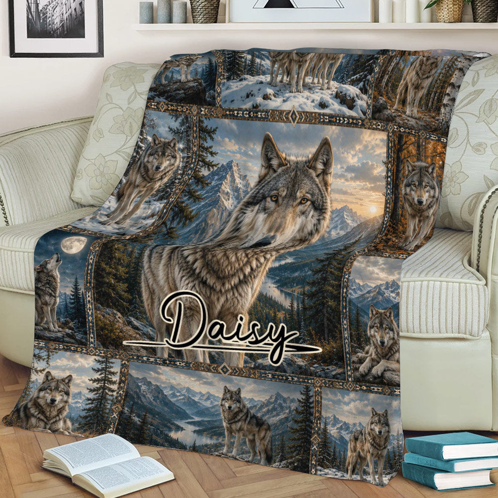 Wolf throw blanket styled on a couch with detailed wolf portraits, mountain scenery, evergreen forests, and lake views