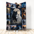 Wolf throw blanket featuring black and white wolves, moonlit scenery, and a dramatic wildlife collage