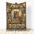 Tiger throw blanket displayed upright with a central tiger portrait and surrounding wildlife scenes
