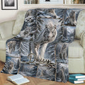 Tiger throw blanket displayed on a couch with white tiger and winter forest artwork