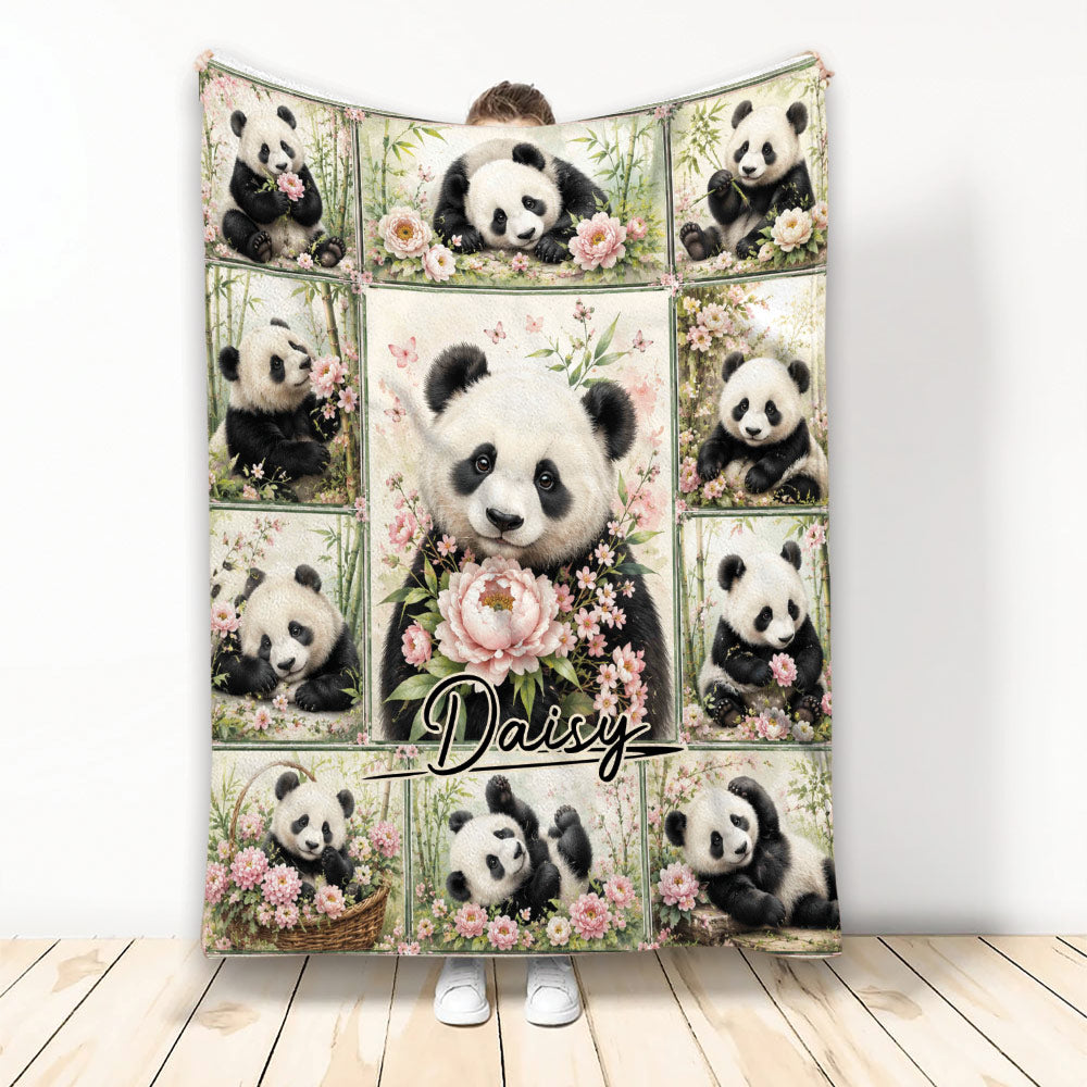 Floral panda throw blanket displayed upright with multiple playful pandas, bamboo, and pink flowers