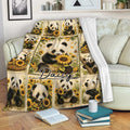 Panda throw blanket draped over a sofa with sunflower artwork and cozy reading nook decor