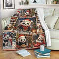 Festive panda throw blanket draped across a couch with Christmas trees, gifts, ornaments, and snowy scenes