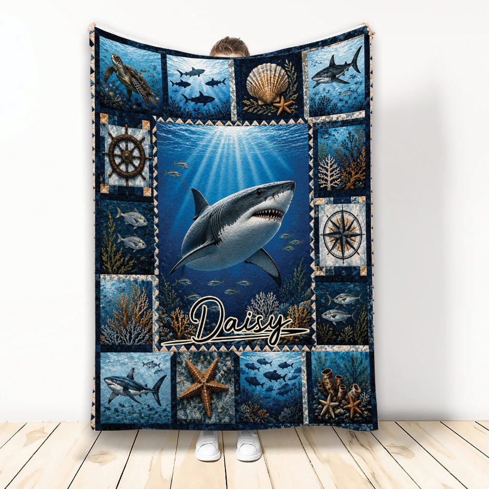 Shark throw blanket displayed upright with an underwater ocean scene, coral, fish, compass, and nautical details