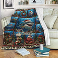 Christmas shark throw blanket draped over a sofa with colorful underwater holiday artwork