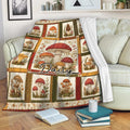 Mushroom blanket draped over a sofa in a cozy reading space