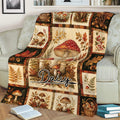 Custom mushroom throw blanket styled on a sofa with rustic woodland artwork, autumn foliage, and forest fungi
