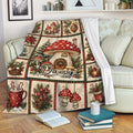 Christmas mushroom throw blanket draped over a sofa with woodland fungi, poinsettias, and holiday motifs