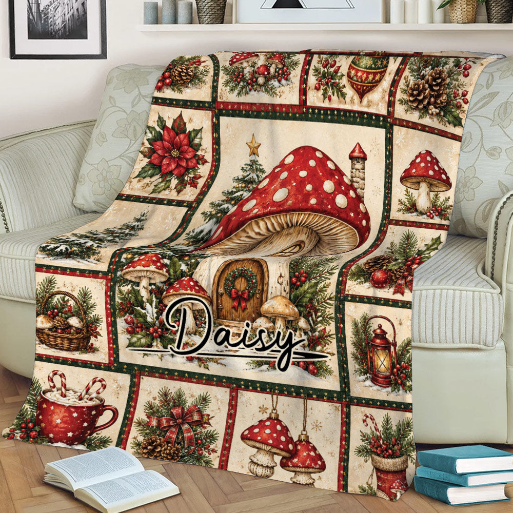 Mushroom blanket displayed on a couch with a large red spotted mushroom and vintage Christmas woodland design