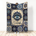 Blue and gold evil eye blanket with ornate mandala artwork displayed upright