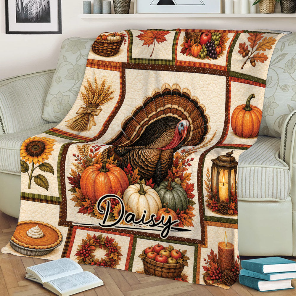 Thanksgiving throw blanket draped over a couch with turkey, pumpkins, pie, wreath, and fall artwork