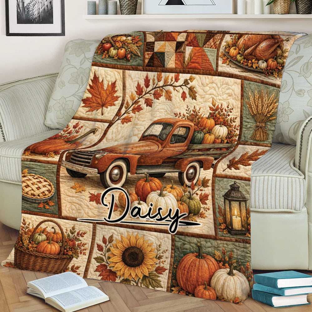 Rustic Thanksgiving blanket displayed on a sofa with a vintage truck, pumpkins, wheat, pie, and fall harvest details