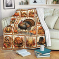 Thanksgiving throw blanket displayed on a sofa with turkey artwork, pumpkins, autumn leaves, and harvest imagery