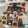 Christmas snowman throw blanket displayed on a sofa with snowflakes, lanterns, gifts, and holiday greenery