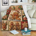 Christmas gingerbread throw blanket draped over a sofa with cookie, candy cane, and holiday tree artwork