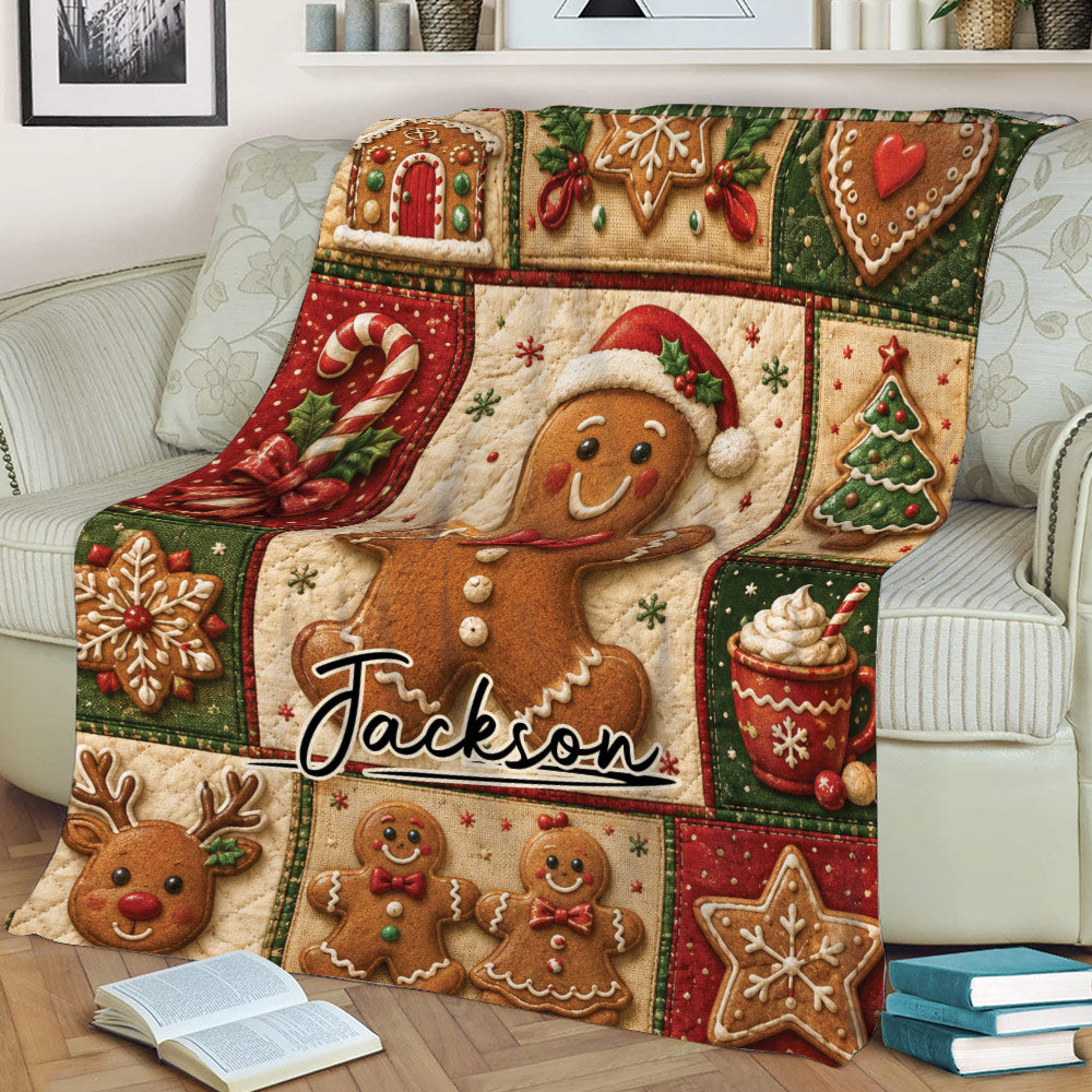 Festive Christmas gingerbread blanket styled on a couch with cookies, reindeer, snowflakes, and candy cane details