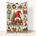 Christmas gnome blanket displayed with festive gnomes, gifts, tree, wreaths, stockings, and holiday cabin artwork