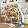 Rustic fall gnome throw blanket displayed on a sofa with pumpkins, mushrooms, and harvest artwork