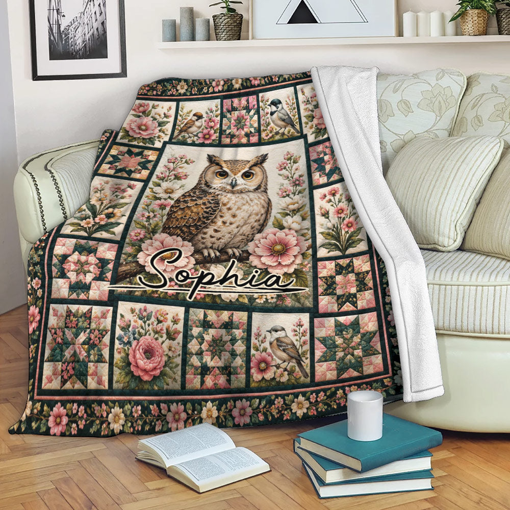 Floral owl throw blanket styled over a sofa with a cozy reading nook and botanical decor