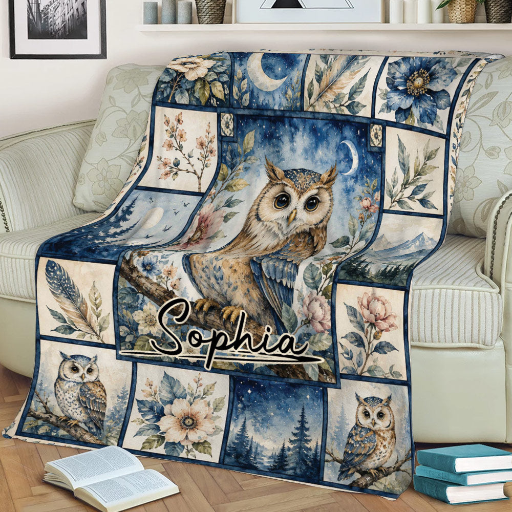 Watercolor owl blanket displayed on a sofa with celestial flowers and forest scenes
