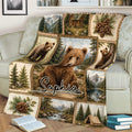 Rustic bear throw blanket displayed on a couch with woodland, mountain and camping scenes