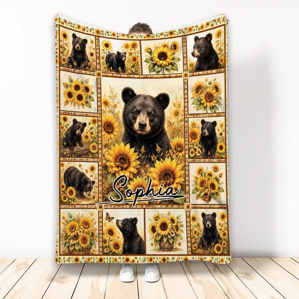 Bear throw blanket featuring black bears surrounded by bright sunflowers in a decorative panel design