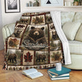 Rustic bear throw blanket displayed on a sofa with woodland wildlife scenes and pinecone details