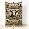 Cow throw blanket featuring farm scenes, sunflowers, barn imagery, and black and white cattle artwork