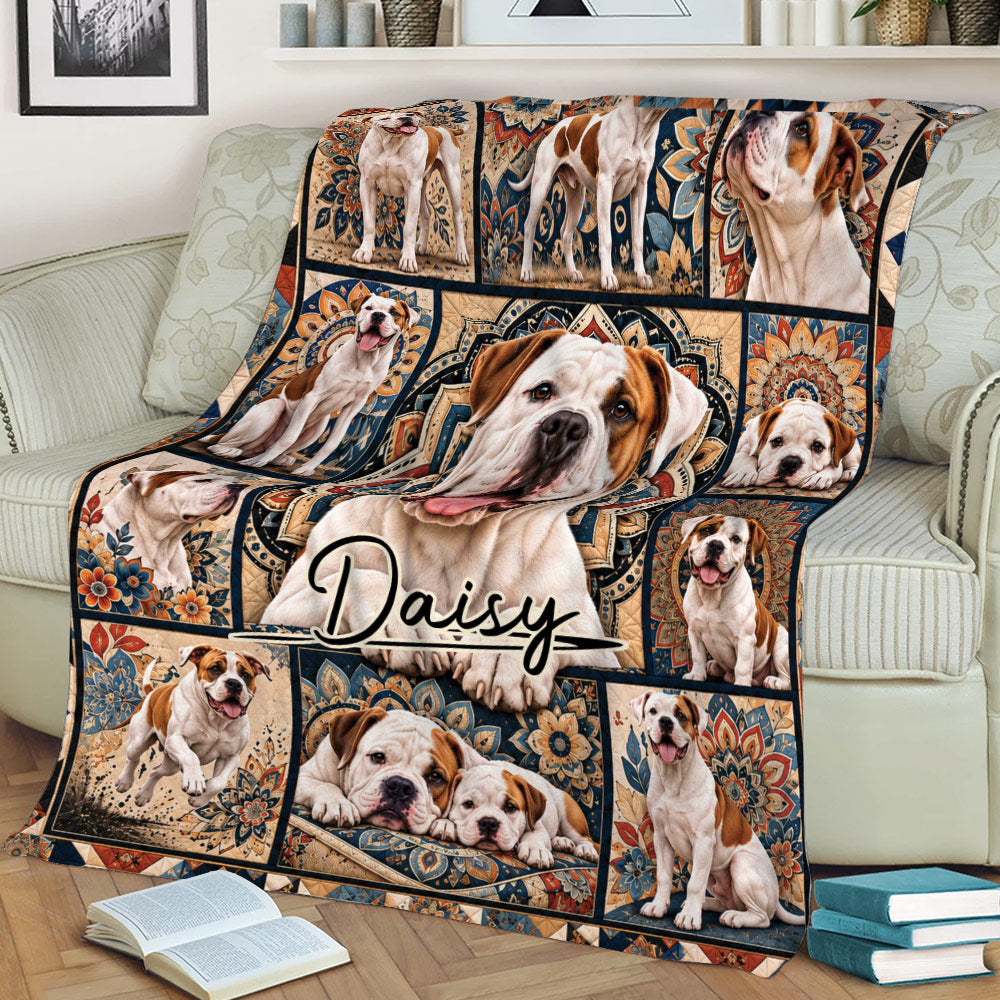 American Bulldog blanket spread across a sofa, featuring a large bulldog portrait surrounded by ornate patterned panels