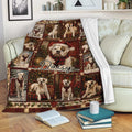 American Bulldog Christmas blanket displayed on a sofa in a cozy living room setting