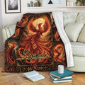 Phoenix throw blanket draped over a sofa, featuring dramatic flames and ornate fantasy artwork