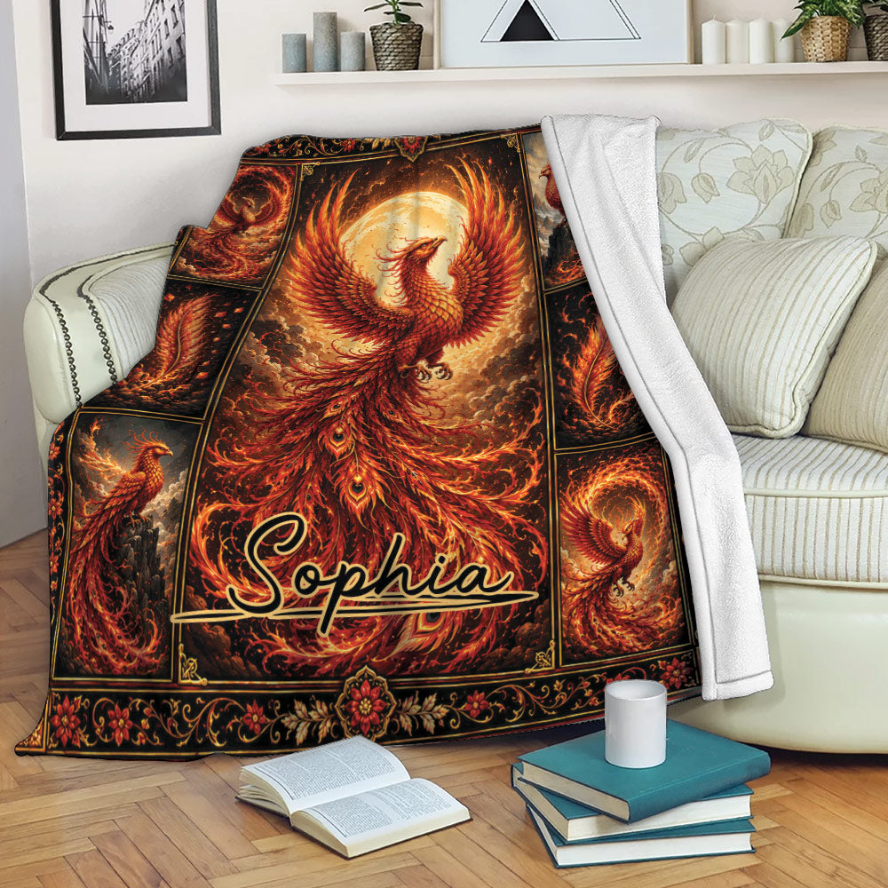 Phoenix throw blanket draped over a sofa, featuring dramatic flames and ornate fantasy artwork