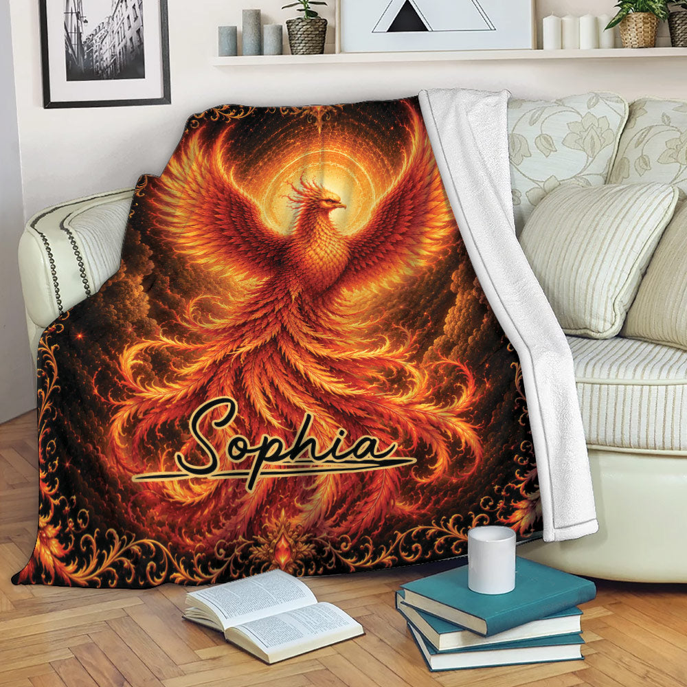 Fiery phoenix blanket draped over a sofa, showcasing radiant red and gold wings and ornate artwork