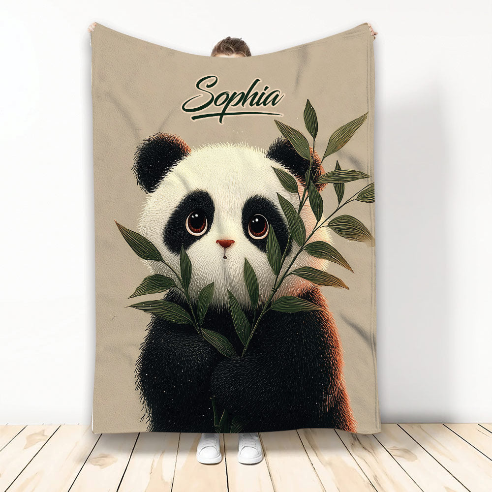 Panda throw blanket featuring a detailed black and white panda surrounded by green bamboo leaves