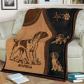 Close view of Brittany Spaniel throw blanket artwork with standing and sitting dog illustrations