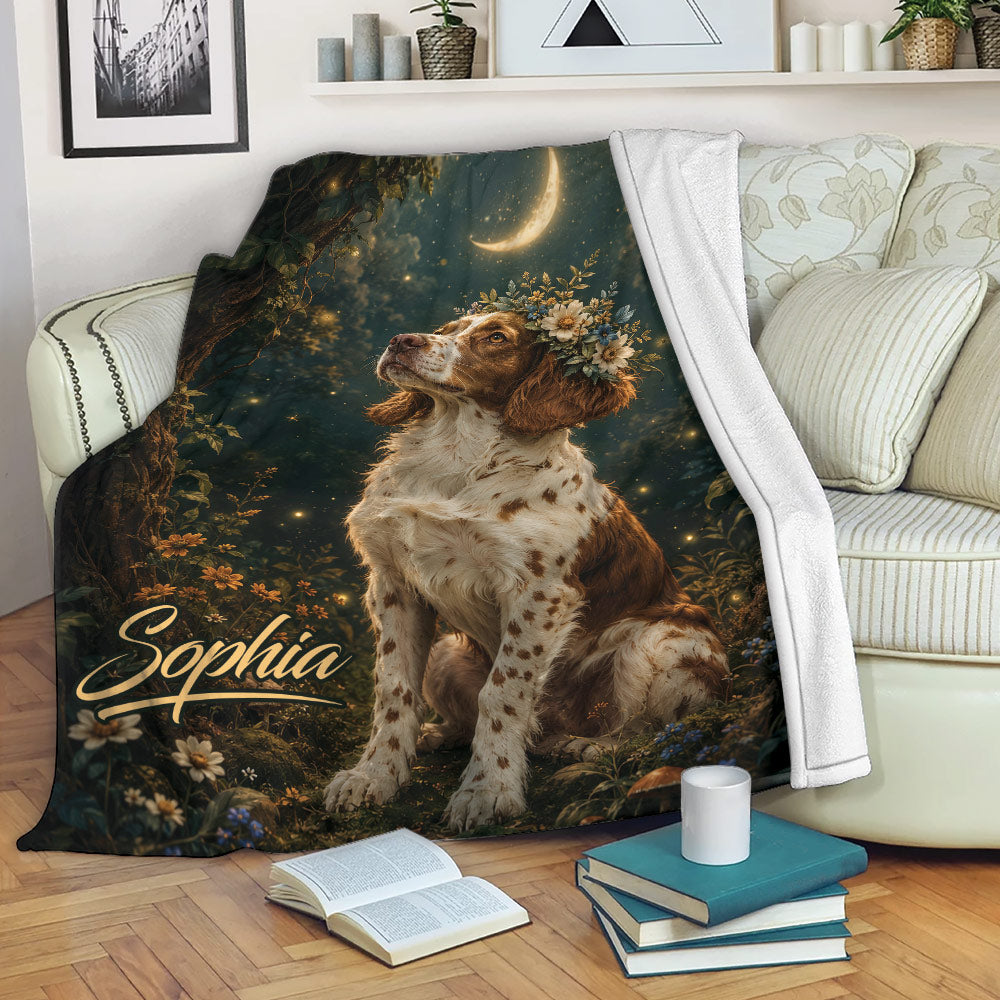 Brittany Spaniel throw blanket draped over a sofa with enchanted forest artwork