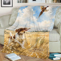 Brittany Spaniel and flying game bird artwork displayed across a living room sofa
